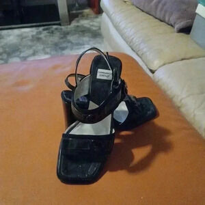 Black high heels sandals with GML decor